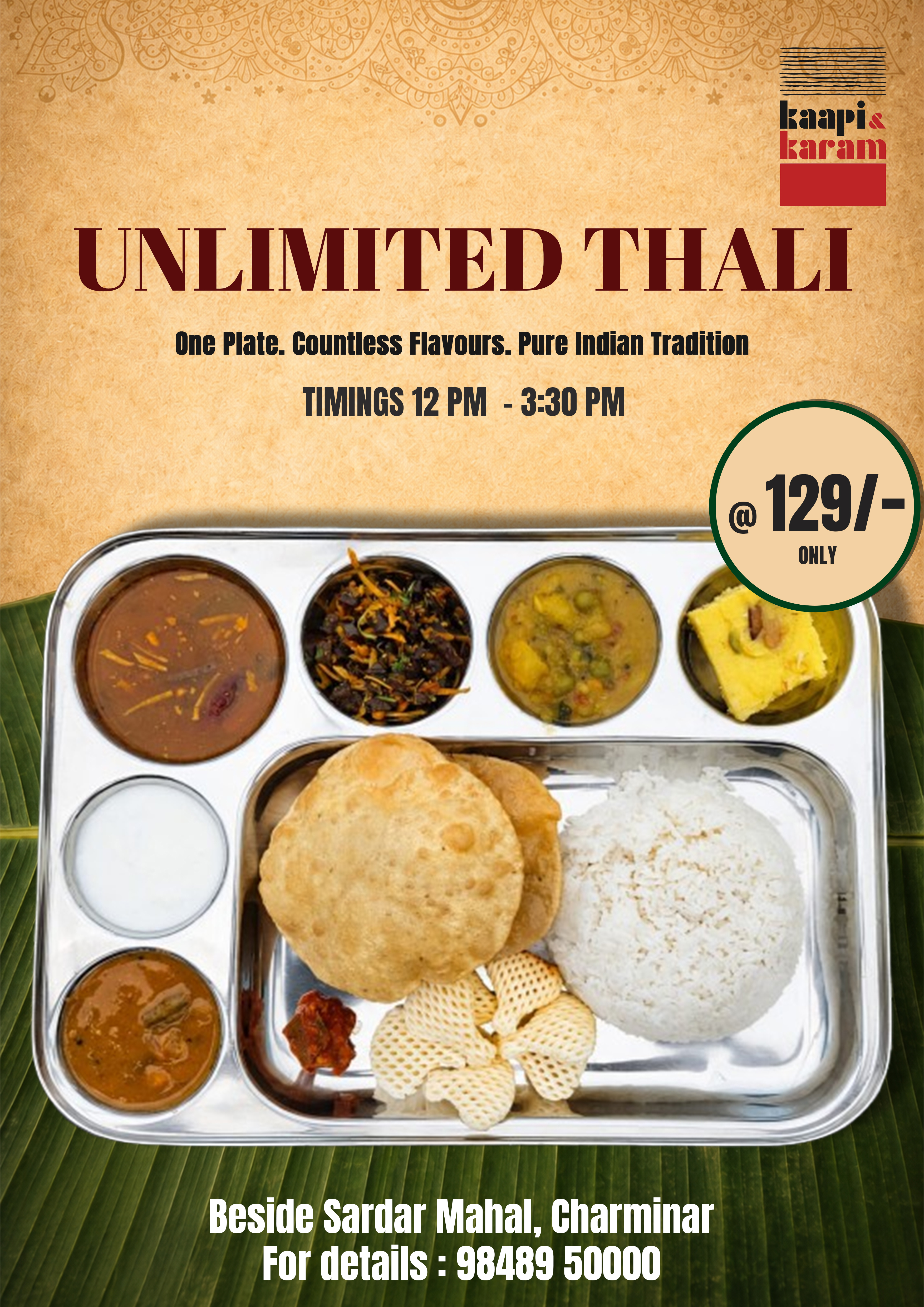 South Indian vegetarian thali at Kaapi & Karam near Charminar — rice, poori, sambar, rasam, veg curry, curd, papad and dessert on a steel plate